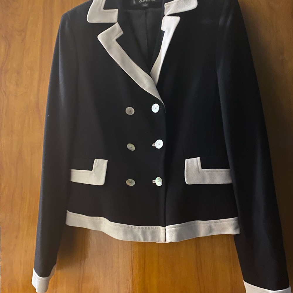 Dark blue/white trim pant suit. Both are lined. Excellent condition.  Worn twice
